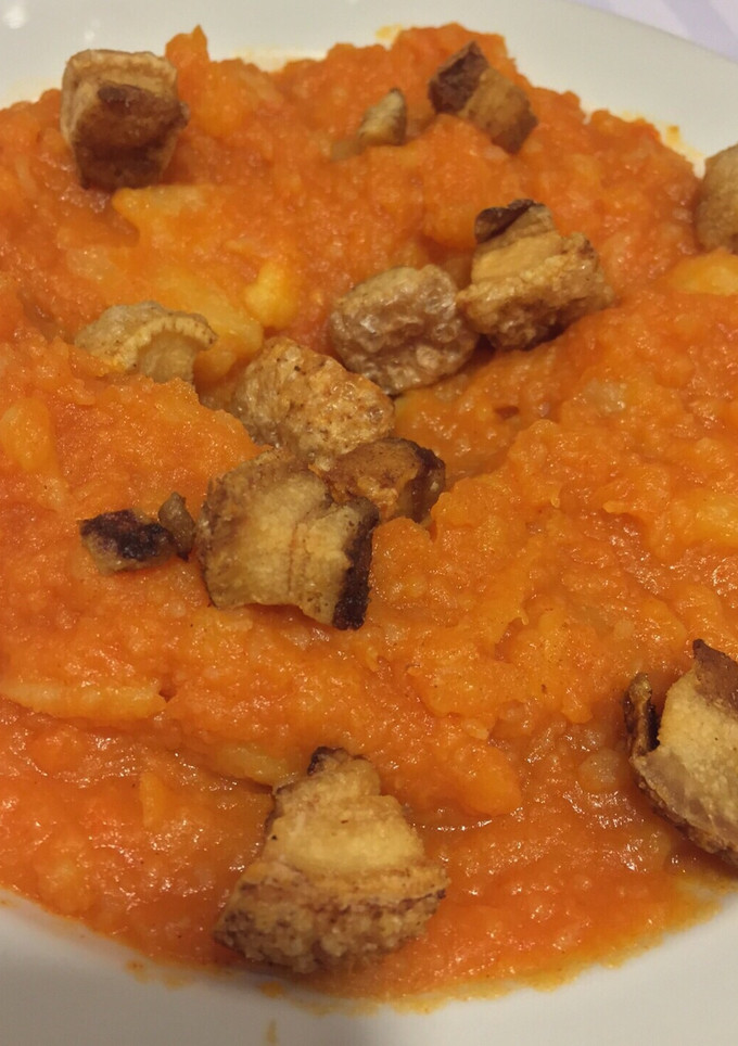 Una foto de Papas revolconas con chicharrón