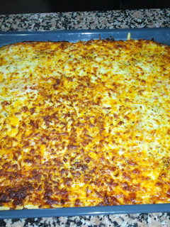 Una foto de Pizza de quesos