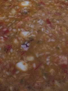 Una foto de Arroz marinero meloso
