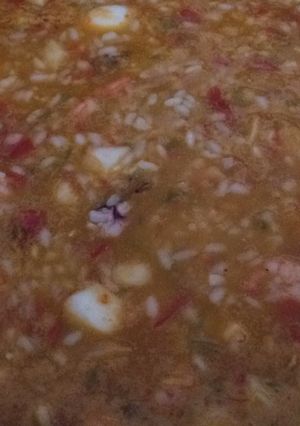 Una foto de Arroz marinero meloso