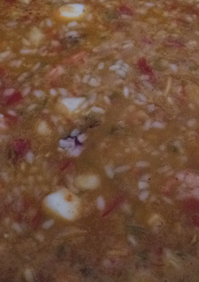 Una foto de Arroz marinero meloso