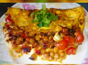 Una foto de 💜Taquitos proteicos💜 Garbanzos, cherrys y cebollita morada 💜