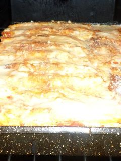 Una foto de Canelones de acelga, ricota, nuez y pollo