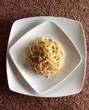 Spaghetti con piñón y nuez a la albahaca
