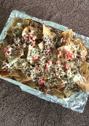A picture of Nachos with Ground Beef and Crispy Melted Cheese.