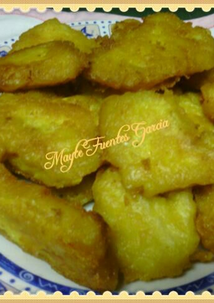Una foto de Bacalao con gabardina