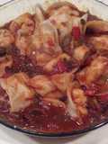 Agñolotis de ricota y salame con salsa funghi