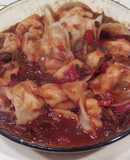 Agñolotis de ricota y salame con salsa funghi