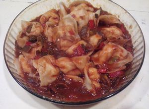 Una foto de Agñolotis de ricota y salame con salsa funghi