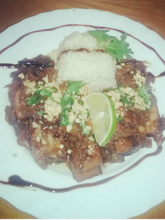 Una foto de Costillas "fusión" en salsa de soja y puerro