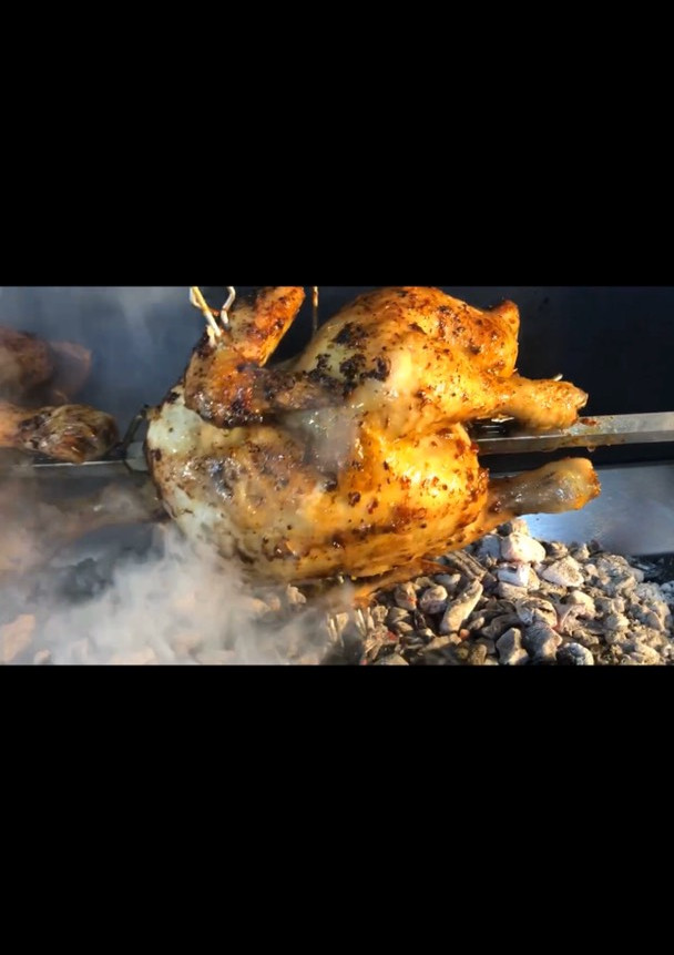 Una foto de Pollo ajoli al asador