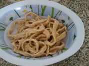Una foto de fideos con harina integral