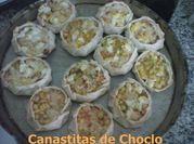 Una foto de canastitas rellenas de choclo