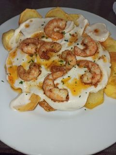 Una foto de Papas arrieras 🥔🦐😋