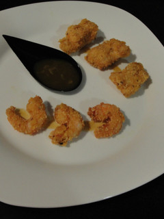 Una foto de Pollo y langostinos rebozados con Fritos (Apta para celíacos e intolerantes al huevo)