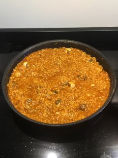 Una foto de Arroz con Caracoles, chirlas y gambas