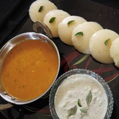 Sooji idli with sambhar and chutney A picture of Sooji idli with sambhar and chutney.