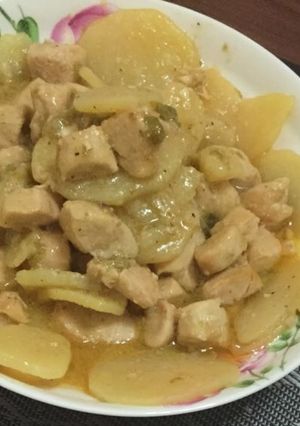 Una foto de Papas compuesta con pollo
