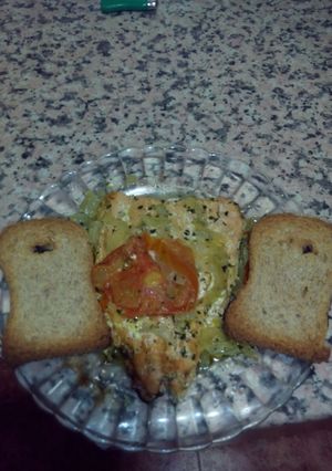 Una foto de Salmón con curry y cilantro