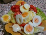 Ensalada de miel y mostaza, con ravioli.