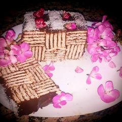 Layered cookie stuffed with chocolate cream A picture of Layered cookie stuffed with chocolate cream.
