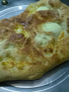 Una foto de Calzone de jamón y queso