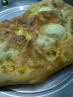 Una foto de Calzone de jamón y queso
