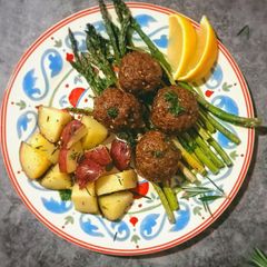 A picture of Beef Meatballs w/ Roasted Potatoes and Spicy Asparagus.