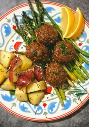 A picture of Beef Meatballs w/ Roasted Potatoes and Spicy Asparagus.