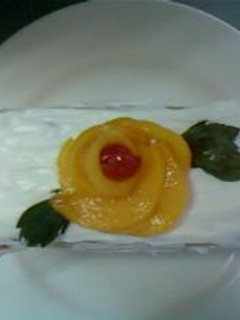 Una foto de Pastel mil hojas (Durazno).