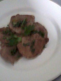 Una foto de Carpaccio de res