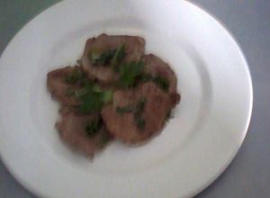 Una foto de Carpaccio de res