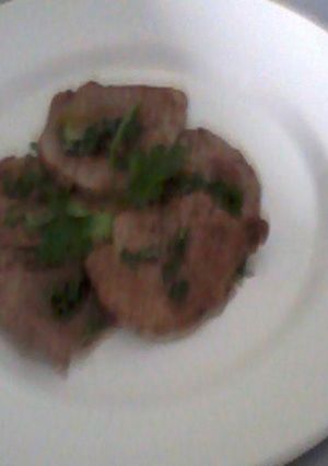 Una foto de Carpaccio de res
