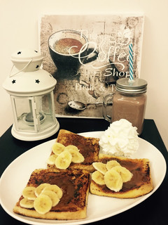 Una foto de Tostadas francesas con dulce de leche y plátano