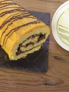 Una foto de Torta coberta com Creme de Pasteleiro