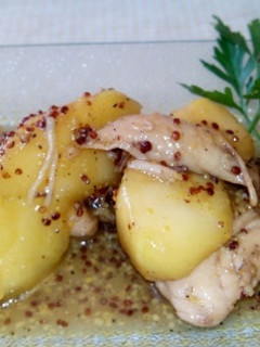 Una foto de Pollo con manzana, miel y mostaza