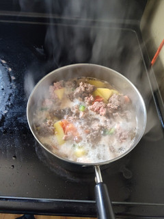 Una foto de Carne molida y verduras