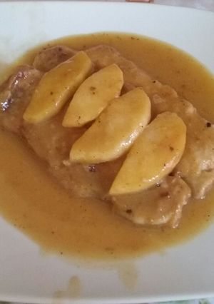 Una foto de Lomo con salsa de naranja