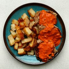A picture of Tuna Patties with Roasted Potatoes.