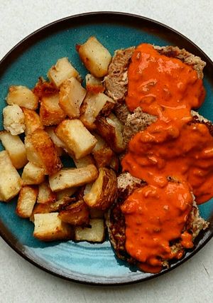 A picture of Tuna Patties with Roasted Potatoes.