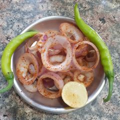 A picture of Rings of fire/ lachcha pyaaz.