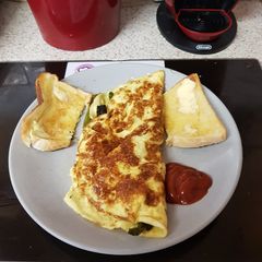 A picture of My folded Egg Breakfast with Asparagus.