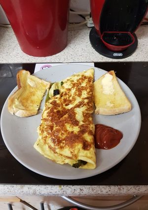 A picture of My folded Egg Breakfast with Asparagus.