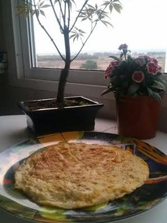 Una foto de Tortilla de manzana flambeada