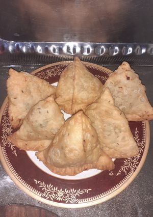 A picture of Chicken veg Samosas.