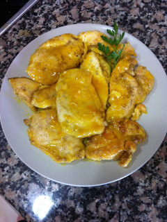 Una foto de Pollo naranja limón