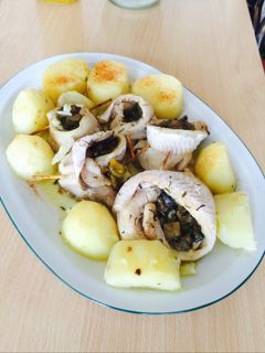 Una foto de Volcanes de merluza con papas al natural