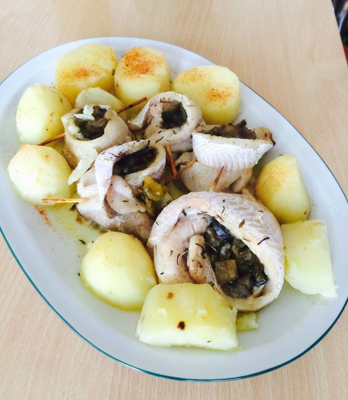 Una foto de Volcanes de merluza con papas al natural