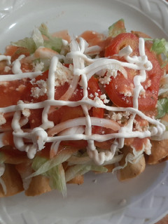 Una foto de Tacos dorados de chorizo con papas