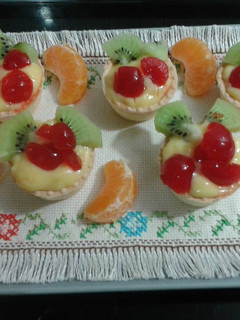 Una foto de Tartaletas con crema de mandarinas y frutas